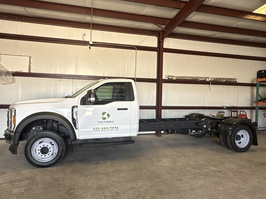 Sustainable Bins roll-off dumpster truck